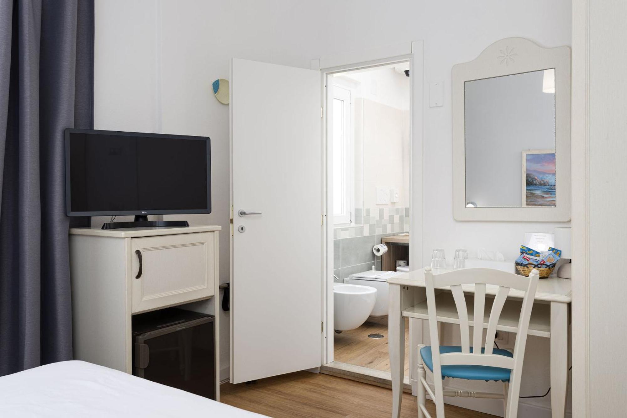 Hotel Conchiglia ปอร์โต เอร์โกเล ห้อง รูปภาพ